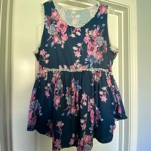 Sleeveless blue top with beautiful pink flowers